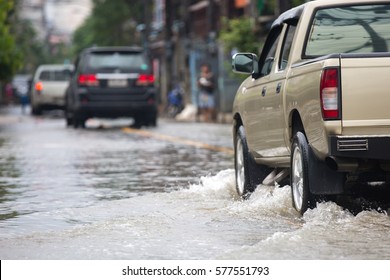 Pickup Truck On A Flooded Street