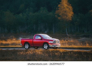 Pickup truck passing through countryside road