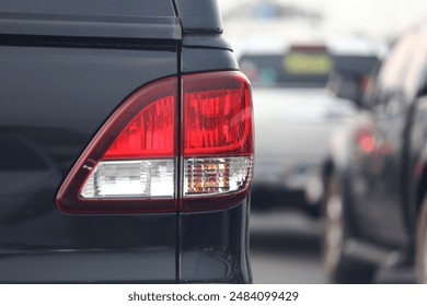 Pickup truck tail lamp with turning light, brake lights, and back-up light. - Powered by Shutterstock