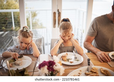 Picky eating kids frustrated with lunch food, fussy at dinner table and struggle in family home with diet. Mad, moody and upset young girl children refuse to eat disgusting, dislike and annoyed meal - Powered by Shutterstock