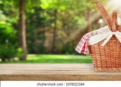 Picnic Basket with napkin on nature background - Powered by Shutterstock