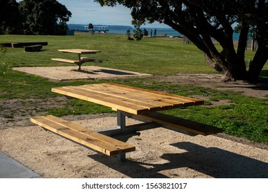 Picnic And BBQ Table In The Public Park By The Beach And Coast