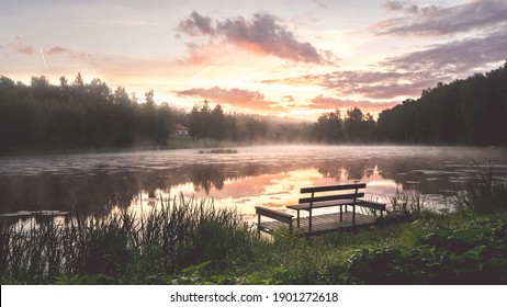 Picnic Bench With Baltic Sunset And Lake View