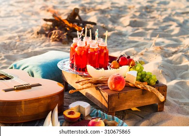 Picnic On The Beach At Sunset In The Style Of Boho