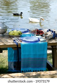 Picnic On A Riverside