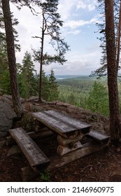 Picnic Table And Benches At Scenic Viewpoint In Finland.