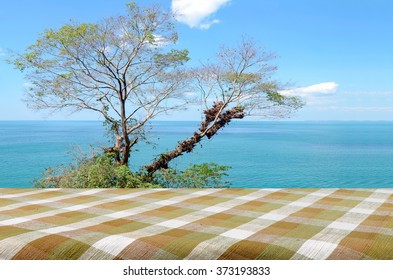 Picnic Table With Bright Sky And South Sea View On The Sunny Day.