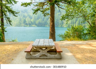A picnic table with gorgeous view at Lake Of The Woods, British Columbia, Canada.