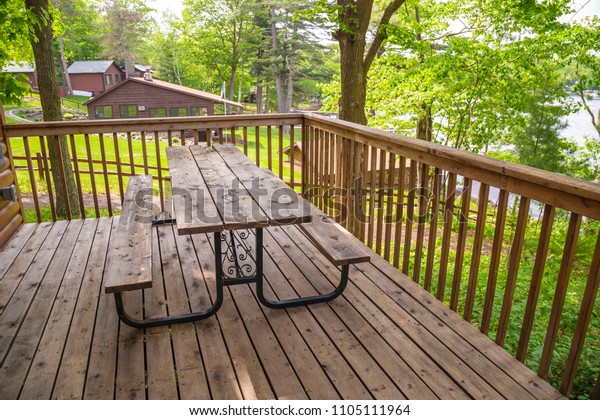 Picnic Table On Porch Patio Cabin Food And Drink Stock Image