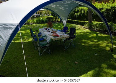 Picnic Table Under A Gazebo Tent           