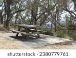 Picnic table under trees at the Mount Mackenzie Scenic Lookout near Tenterfield in New South Wales, Australia