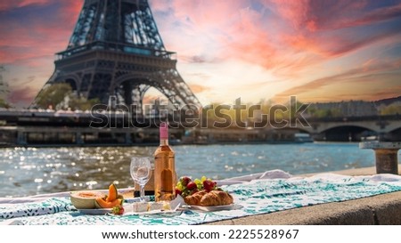 Picnic and wine near the Eiffel Tower. Selective focus. Food.