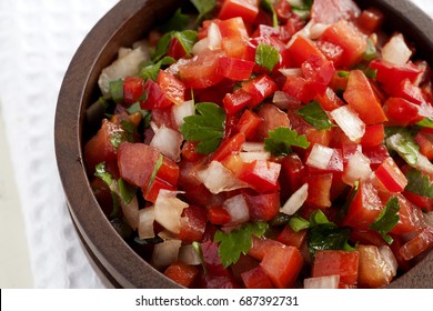 Pico De Gallo Salsa In Wooden Bowl. Close Up.