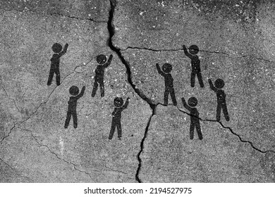Pictograms representing the conflict are painted on the cracked concrete.