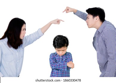 Picture of angry parents arguing in front of their sad son while standing in the studio. Isolated on white background