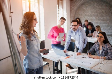 Picture Of Architect Doing Presentation To Her Colleagues