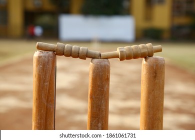 Picture of bails kept on top of the wickets during a cricket match - Powered by Shutterstock