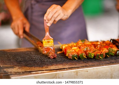 The picture of barbecue being grilled. - Shutterstock ID 1479855371