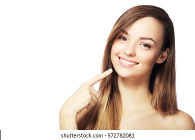 Picture Of Beautiful Woman Pointing To Teeth