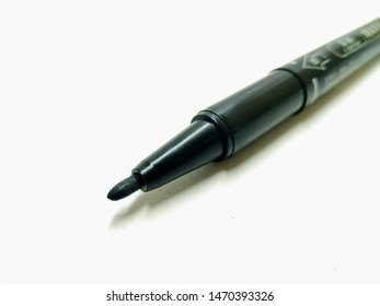 A picture of black marker on white background