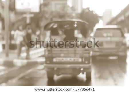 Picture blurred  for background abstract and can be illustration to article of threewheeler classic motorised tuk-tuk taxi in Bangkok, Thailand