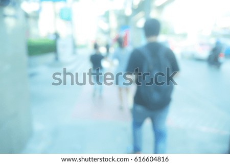 Picture blurred for background abstract and can be illustration to article of people walking in the street