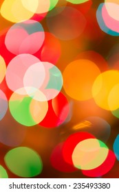 A Picture Of Blurred Christmas Lights. An Illustration For Winter Holiday Moods And Christmas Spirit.