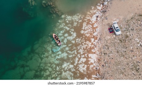 A Picture Of A Boat In The Mosul Dam Lake By A Drone