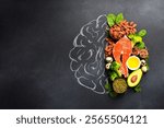 A picture of the brain drawn in chalk with various food products: fish, meat, nuts, vegetables and greens. Healthy food.