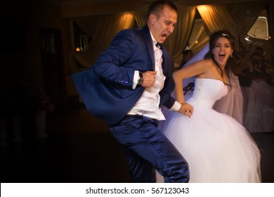 A picture of the bride and groom dancing after the ceromony