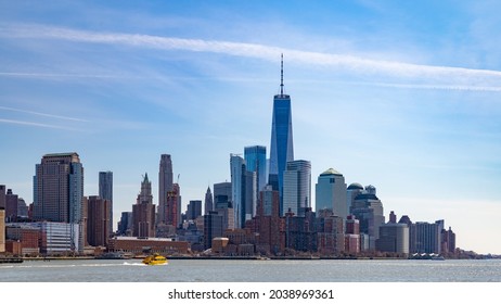 A picture of the buildings at Lower Manhattan towered by the One World Trade Center.