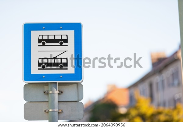 Picture of bus and trolley station sign in\
the city. Public\
transportation