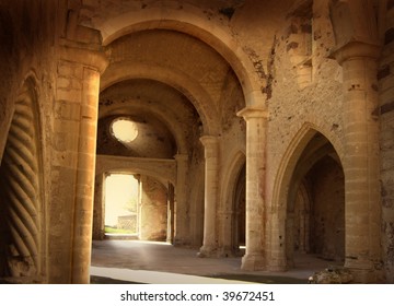 picture caught in sardinia. subject show an interior of a ruined ancient italian church romanic style