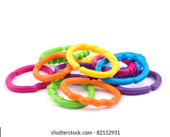 Picture Of Colorful Teething Rings On White Background.