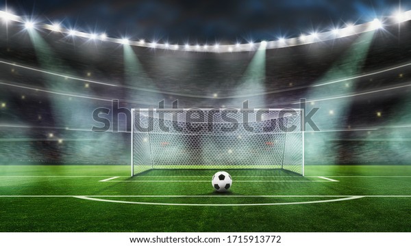 The\
picture is a composition, not a real stadium------ Ball on the\
green field at soccer stadium. ready for game in\
fro