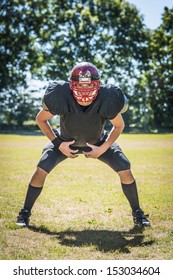 picture of concentrated american football player in position