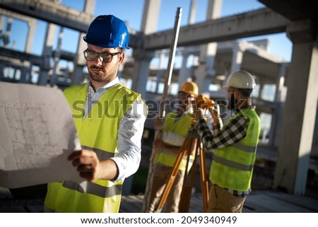 Picture of construction engineer working on building site