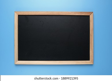 A picture of copyspace blackboard on blue background.