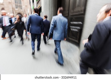 Picture With Creative Motion Blur Effect Made By Camera From Business People On The Move At Wall Street, Manhattan, NYC