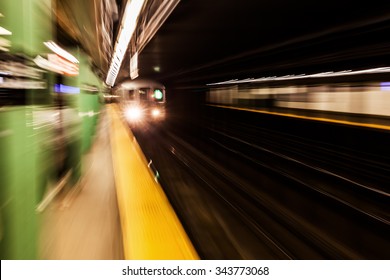 Picture With Creative Zoom Effect Of A Subway Train At A Subway Station In NYC