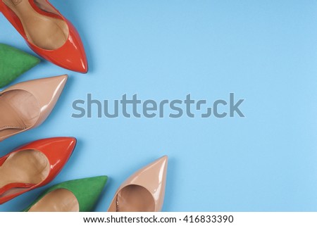 picture of different shoes, Shot of several types of shoes, Several designs of  women shoes. Leather Shoe. Pile of various female shoes on on  light  background. Copy space for text.