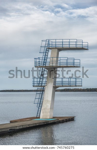 Picture of diving tower at\
the lake