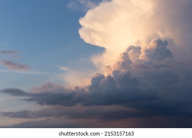 Picture dramatic clouds just before sunset. Landscape size.