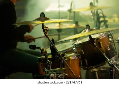 Picture of drums during a concert. - Powered by Shutterstock