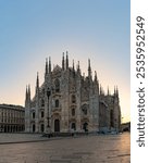 A picture of the Duomo di Milano or Milan Cathedral at sunrise.