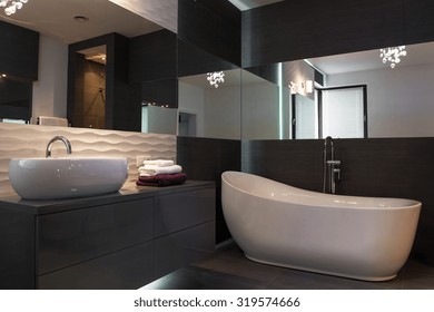 Picture of elegant fixture in luxurious dark bathroom interior