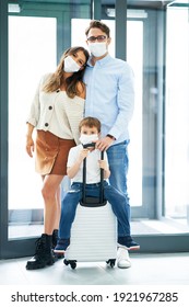 Picture Of Family Checking In Hotel