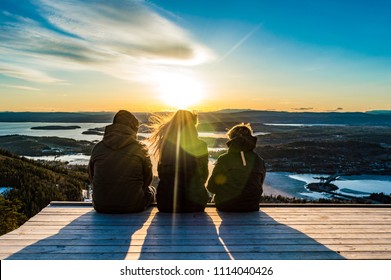 Picture of family siting and admiring views - Shutterstock ID 1114040426