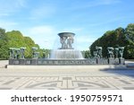 Picture of the fountain in the outdoor open sculpture park (Vigelandspark) in summer with a clear blue sky, Oslo, Norway 