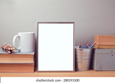 Picture Frame Mock Up Template With Books And Desk Objects